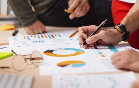 People reviewing graphs