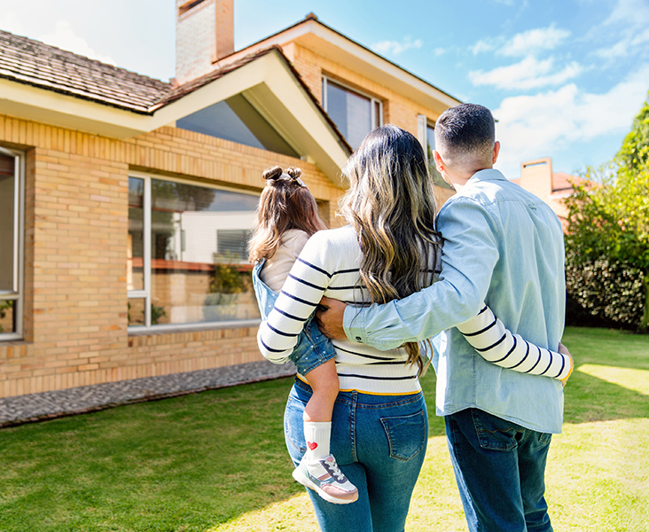 Family looking at their new home.