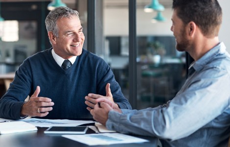 Two people in a meeting